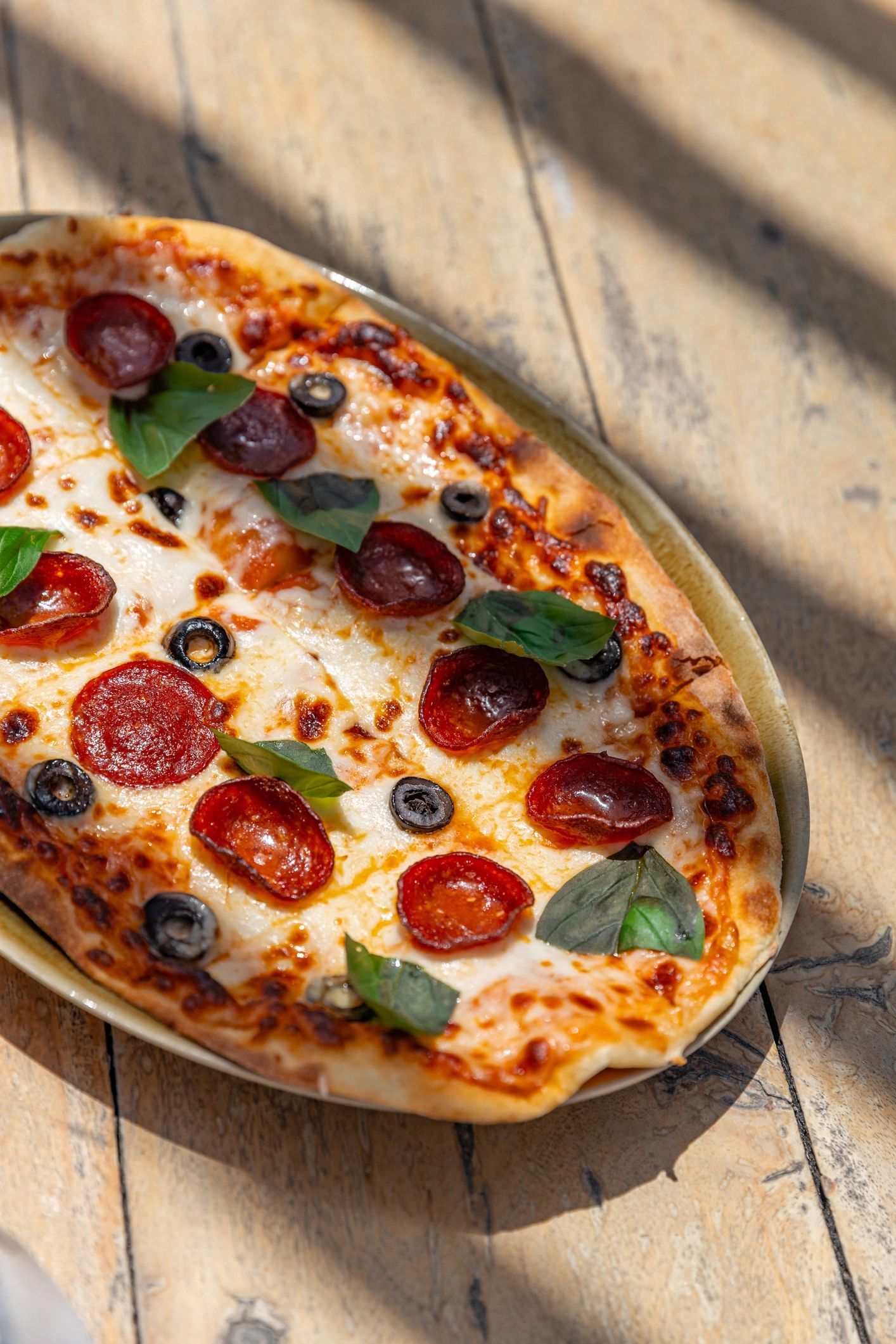 Fresh pizza on table at Mountain Mike's Pizza